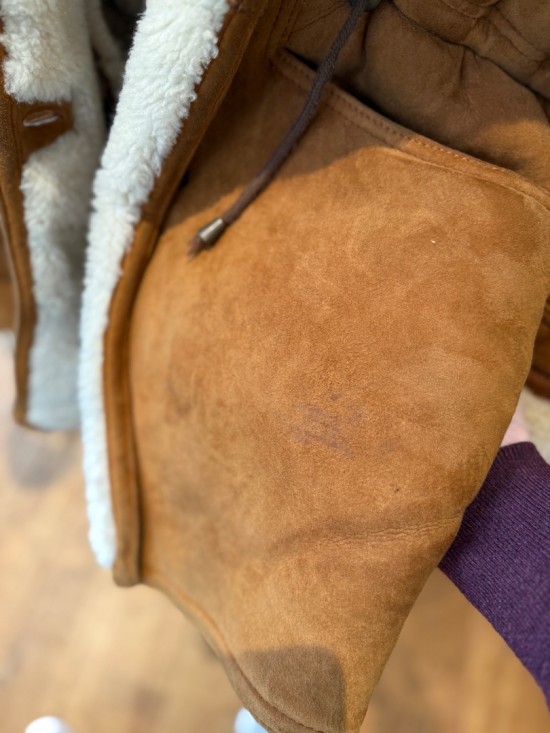 *vague stain on pocket